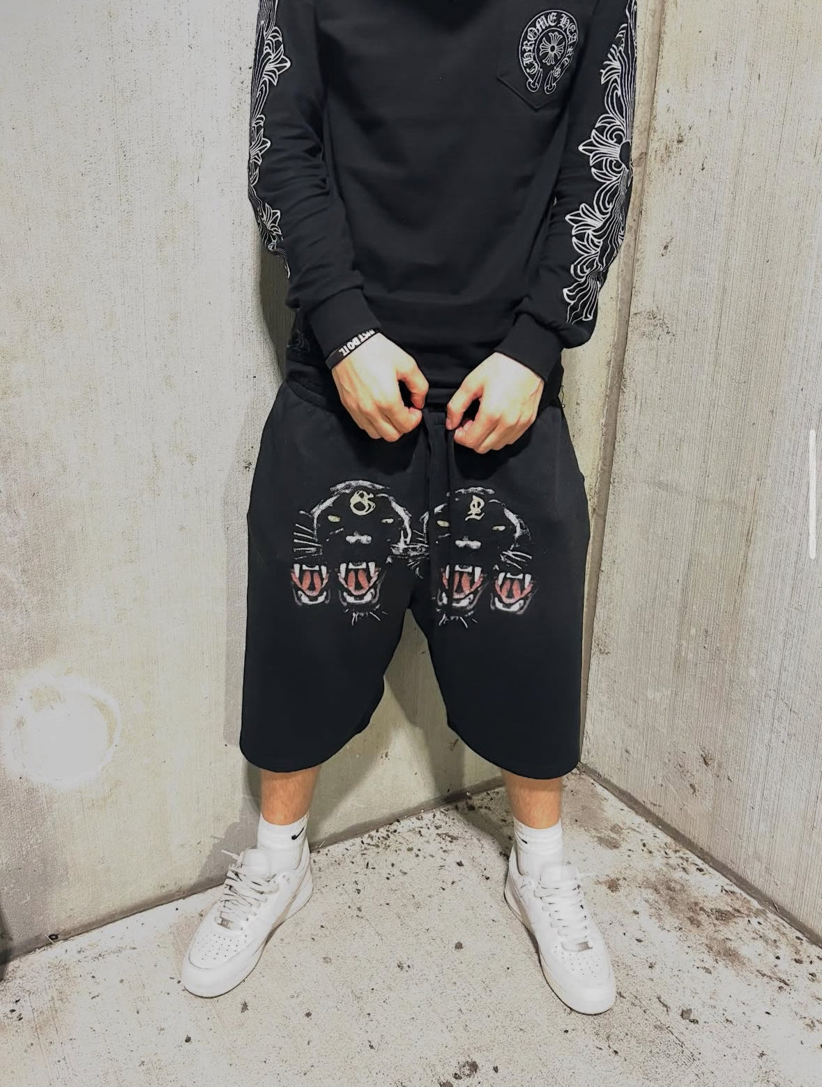 “Black coated panther” baggy shorts